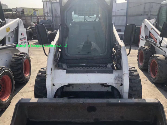 44.7 KW de segunda mano Mini cargador de diapositivas BOBCAT S185 Mini Skid Steer para precios adecuados