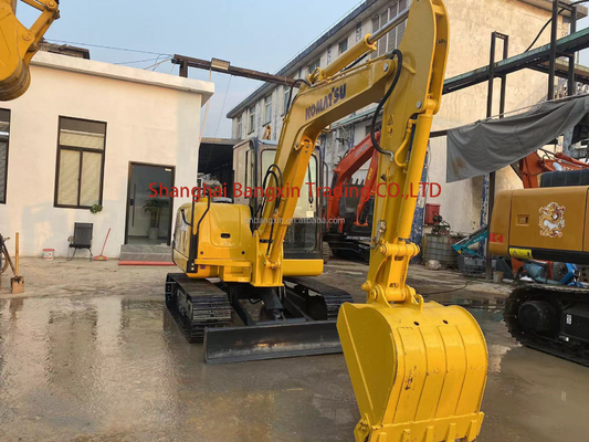 Excavadora Komatsu PC56 usada con válvula hidráulica original y un año después del período de venta
