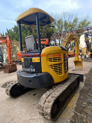 Excavadora Komatsu PC40MR-3 de uso comercial con capacidad de 0.19 cubos y peso de 4000 kg